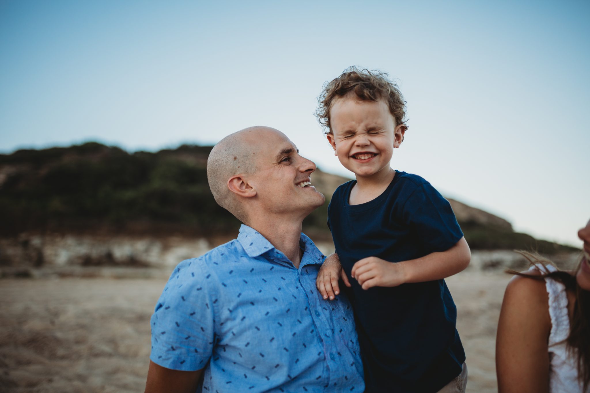Newcastle family photographer; father and son smiling