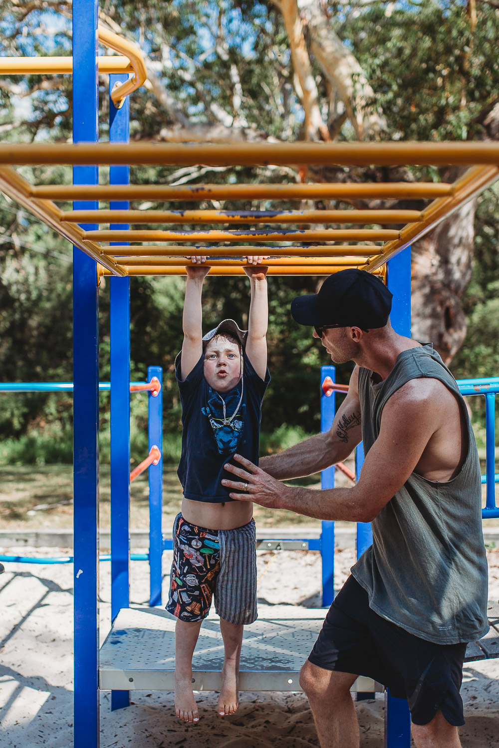 Newcastle family photographer beach summer holiday kids fun at playground