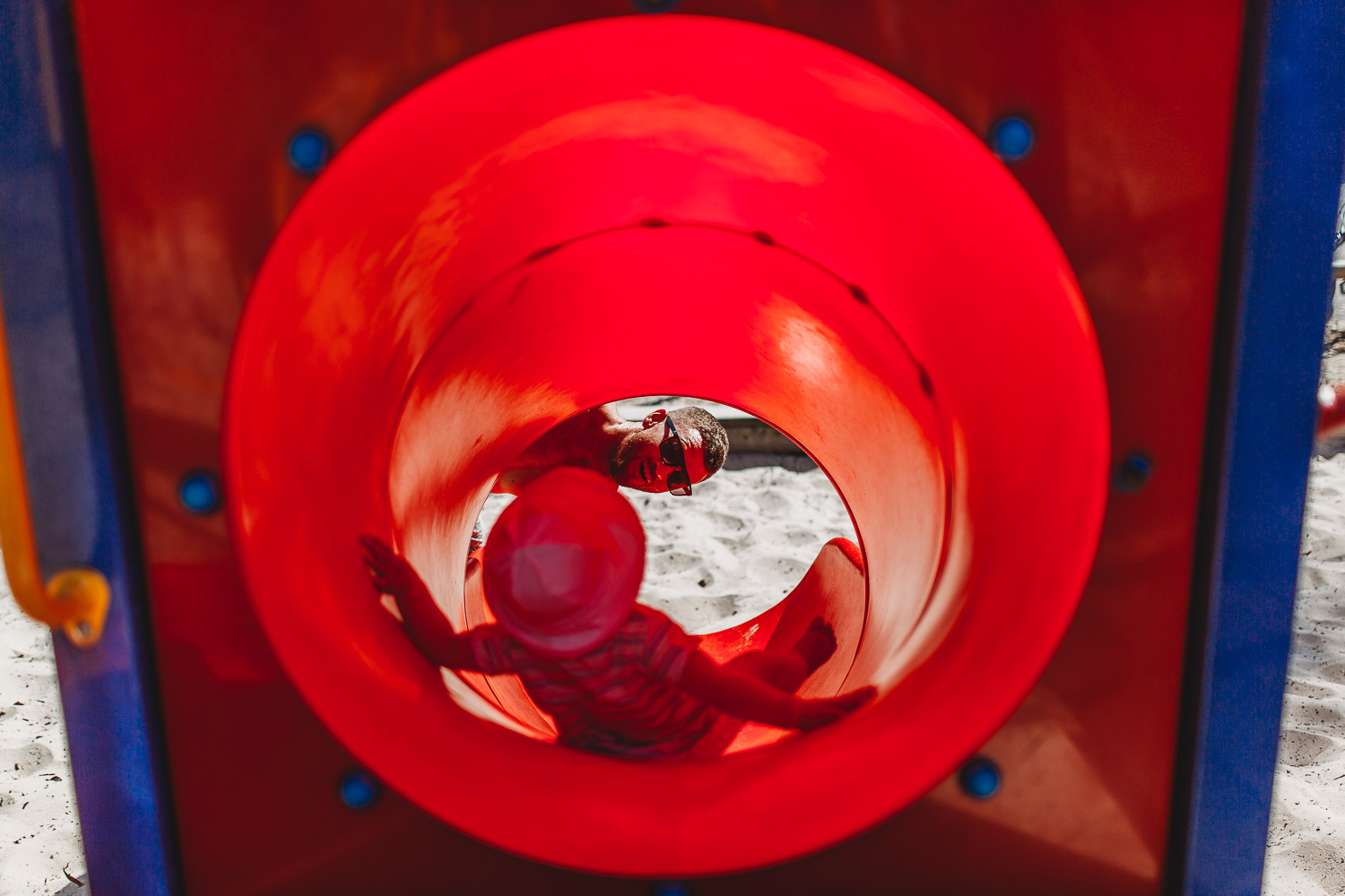 Newcastle family photographer beach summer holiday kids fun at playground