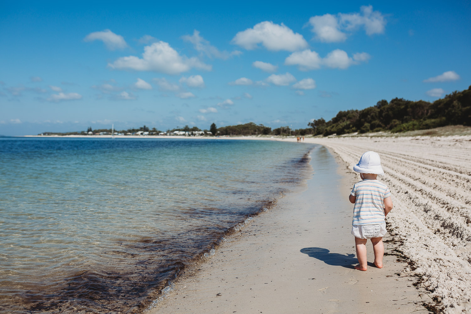 Newcastle family photographer beach summer holiday kids fun at playground