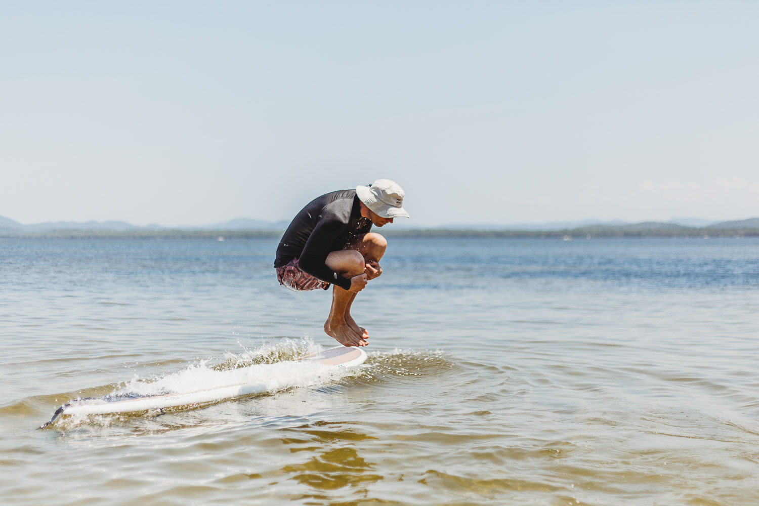 Newcastle family photographer beach summer holiday kids fun at playground