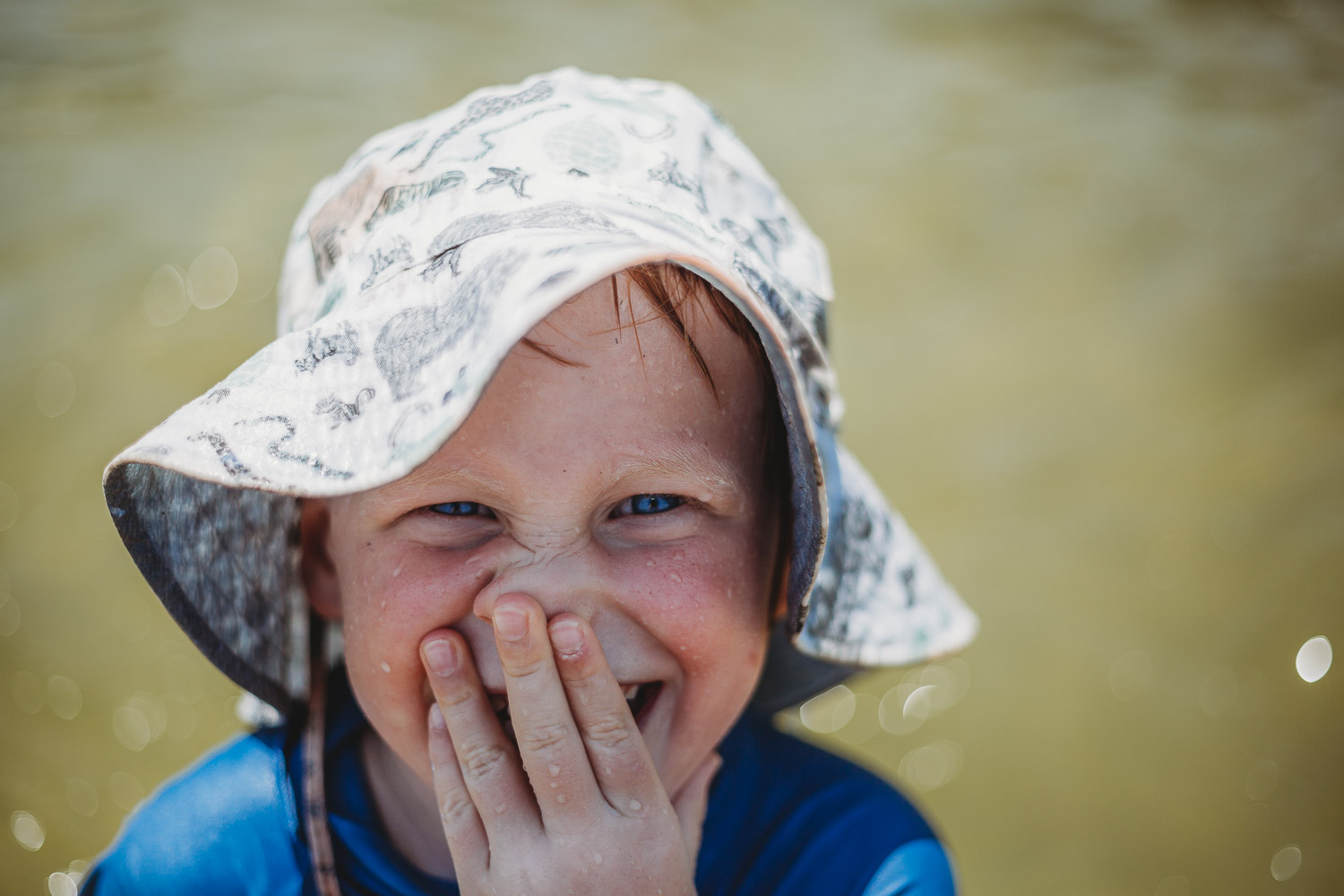 Newcastle family photographer beach summer holiday kids fun at playground