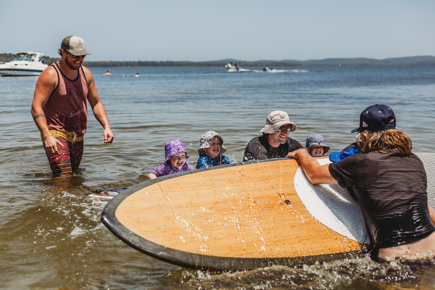 Newcastle family photographer beach summer holiday kids fun at playground