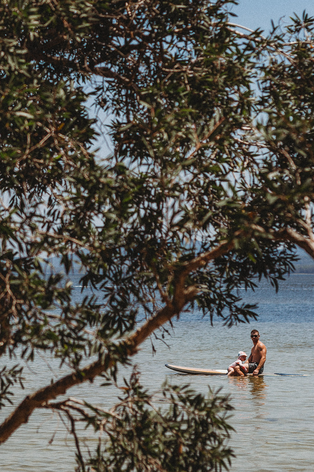 Newcastle family photographer beach summer holiday kids fun at playground