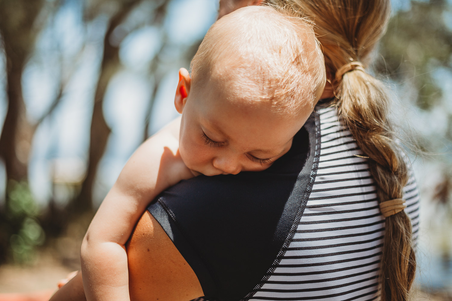 Newcastle family photographer beach summer holiday kids fun at playground