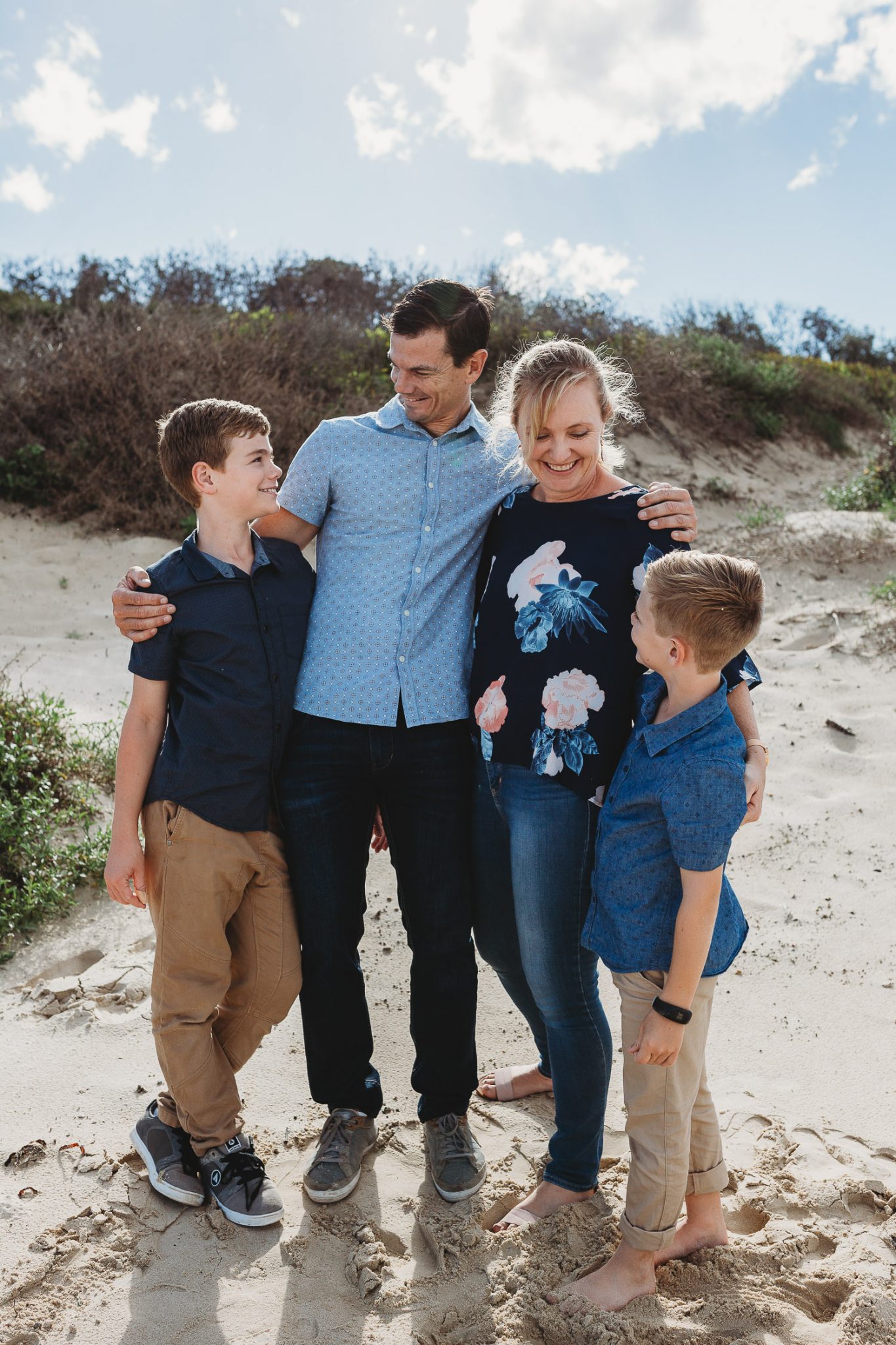 Family lifestyle photography sons smiling with mother and father